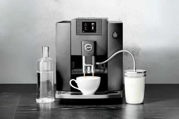 The Jura E6 is typically around $400 cheaper than the ENA 8